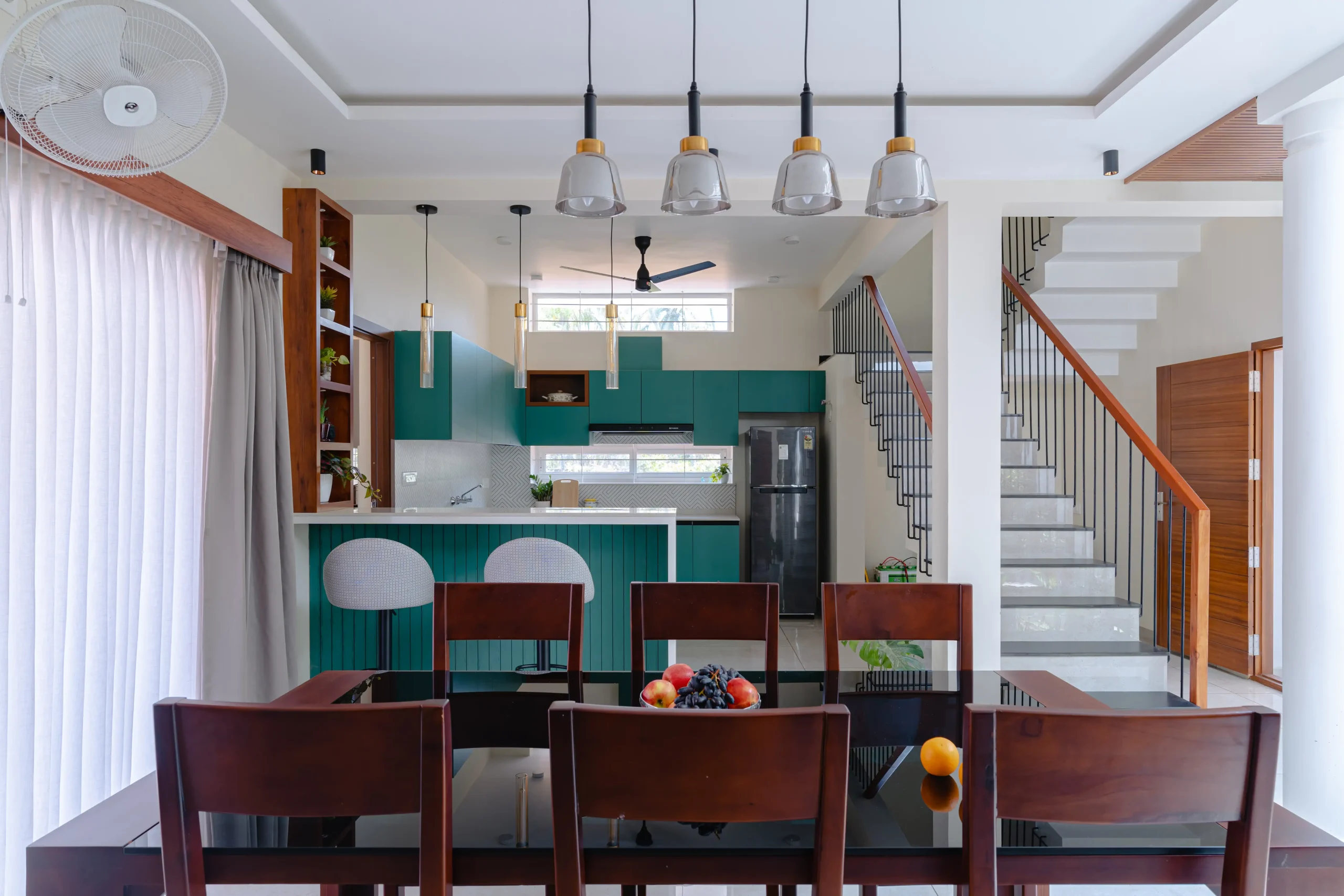 Beautiful dining space designed by Adora Architects, merging architecture and interior design for a functional yet inviting atmosphere.